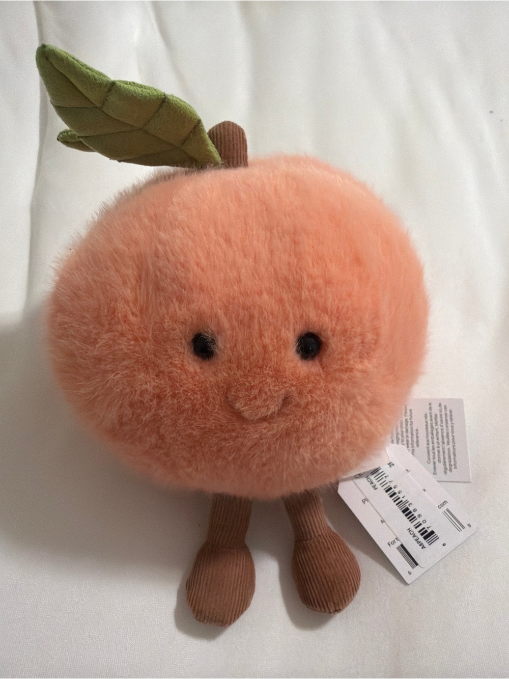 Jellycat Peach Plush with Green Leaf and Brown Corduroy Legs